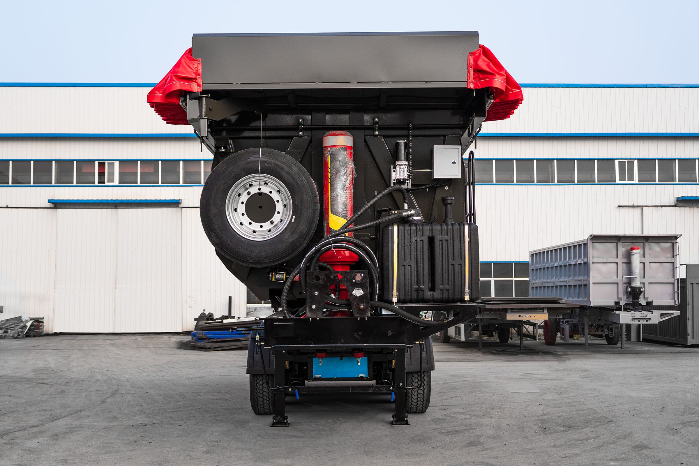 Dump trailer with electric tarp